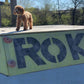 Playful miniature poodle enjoying outdoor time
